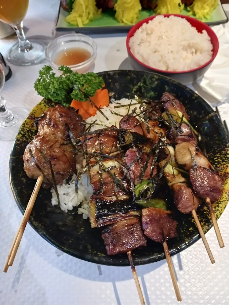 Brochette de Canard Laqué Sur Son Lit de Riz Vinaigré